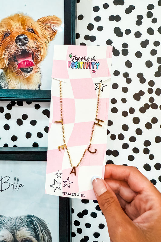 TEACH necklace.